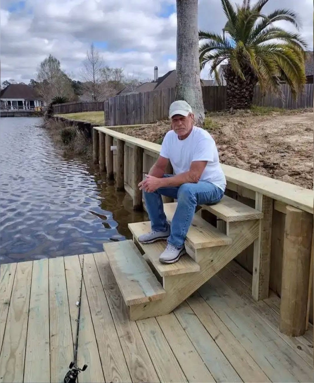 Mark of LA Fence & Bulkheads on a finished waterfront dock and timber bulkhead in Southeast Louisiana
